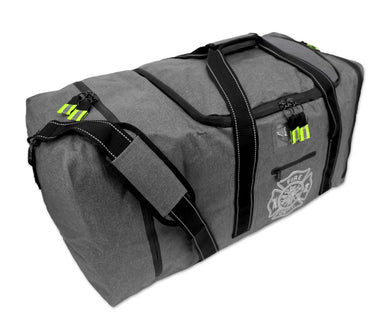 mage of a durable, grey firefighter gear bag with reflective lime green stripes, featuring a 'FIRE DEPT' logo, designed with water-resistant zippers and compartments for helmet, boots, and personal effects,