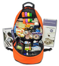 The uploaded image showcases the open Lightning X Special Events EMT First Responder Trauma Backpack, filled with organized medical supplies such as bandages, shears, a blood pressure cuff, a stethoscope, and other essential first aid items. It demonstrates the backpack's storage capacity and organizational features.